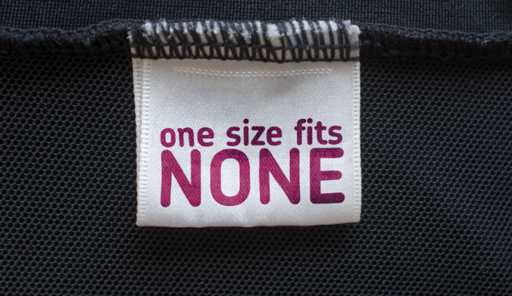 Apparel tag saying "one size fits none"